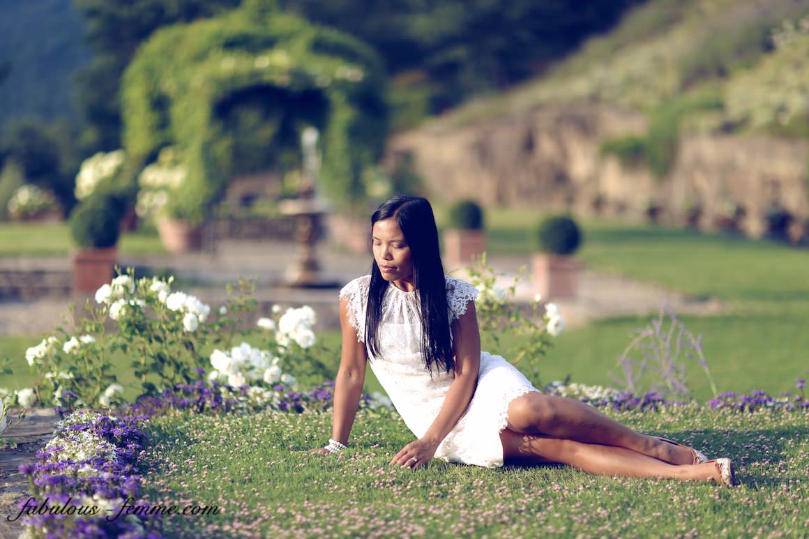 girl on grass in garden of luxury wine resort