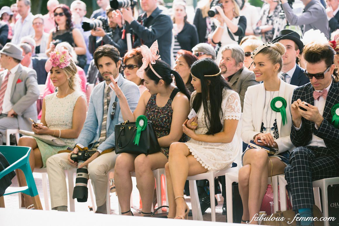 watching the fashion competition - melbourne caulfield cup