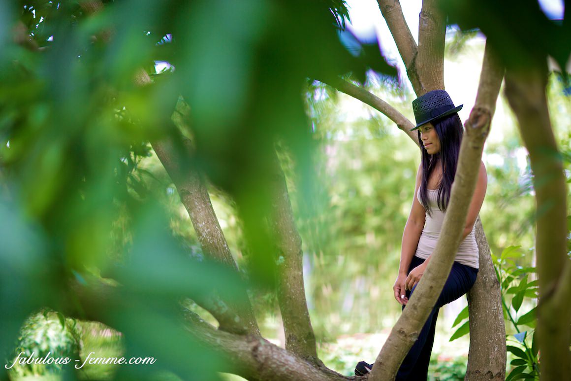 photo shoot in hoi an vietnam - girl climbing a mango tree