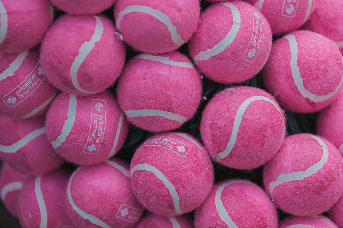 pink tennis balls - priceline sponsor