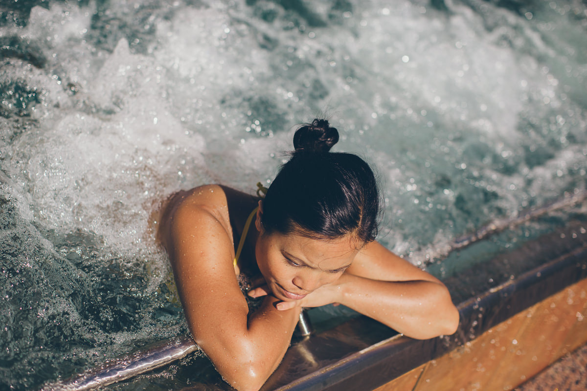 girl in spa pool - luxury resorts