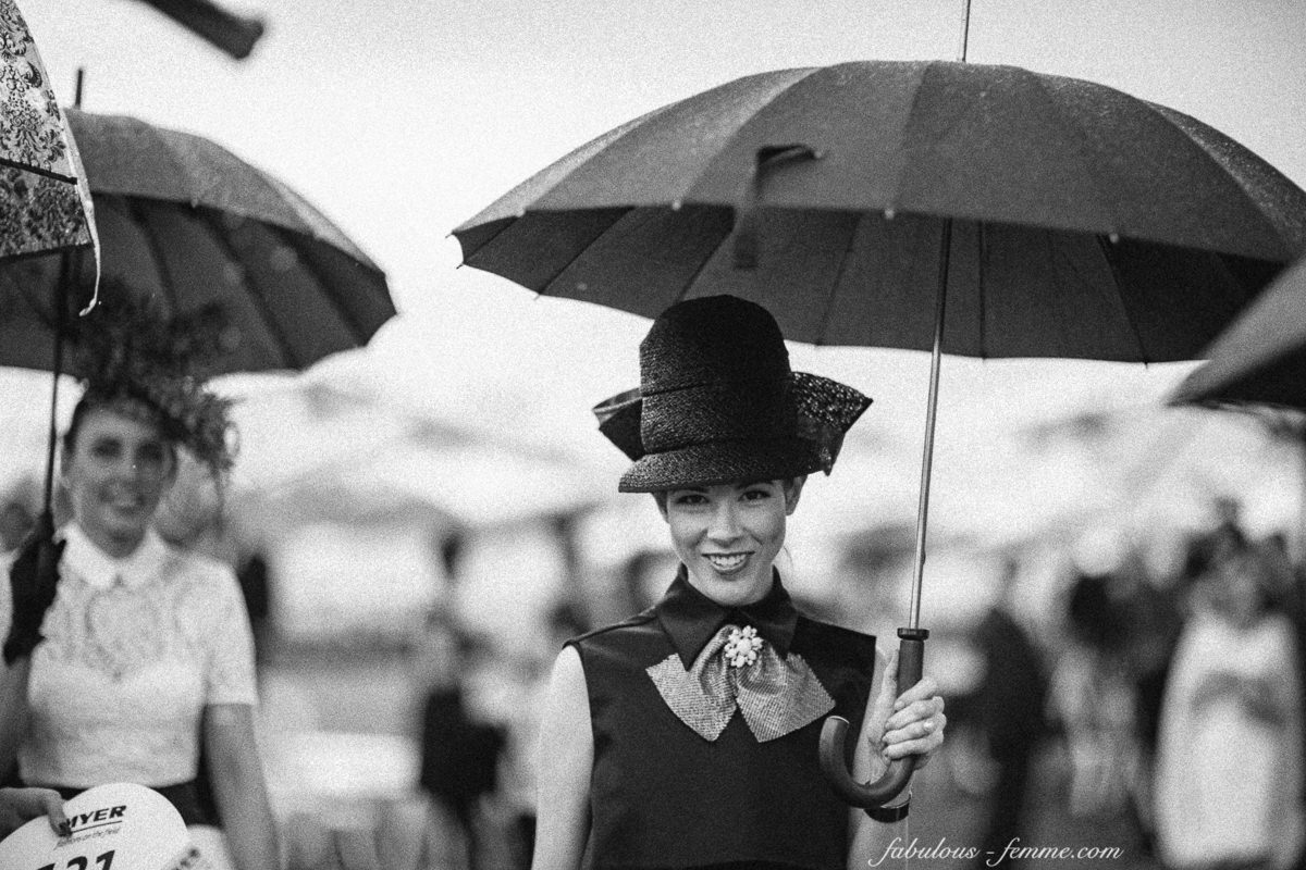 stylish lady with umbrella in black and white - millinery - Melbourne Cup