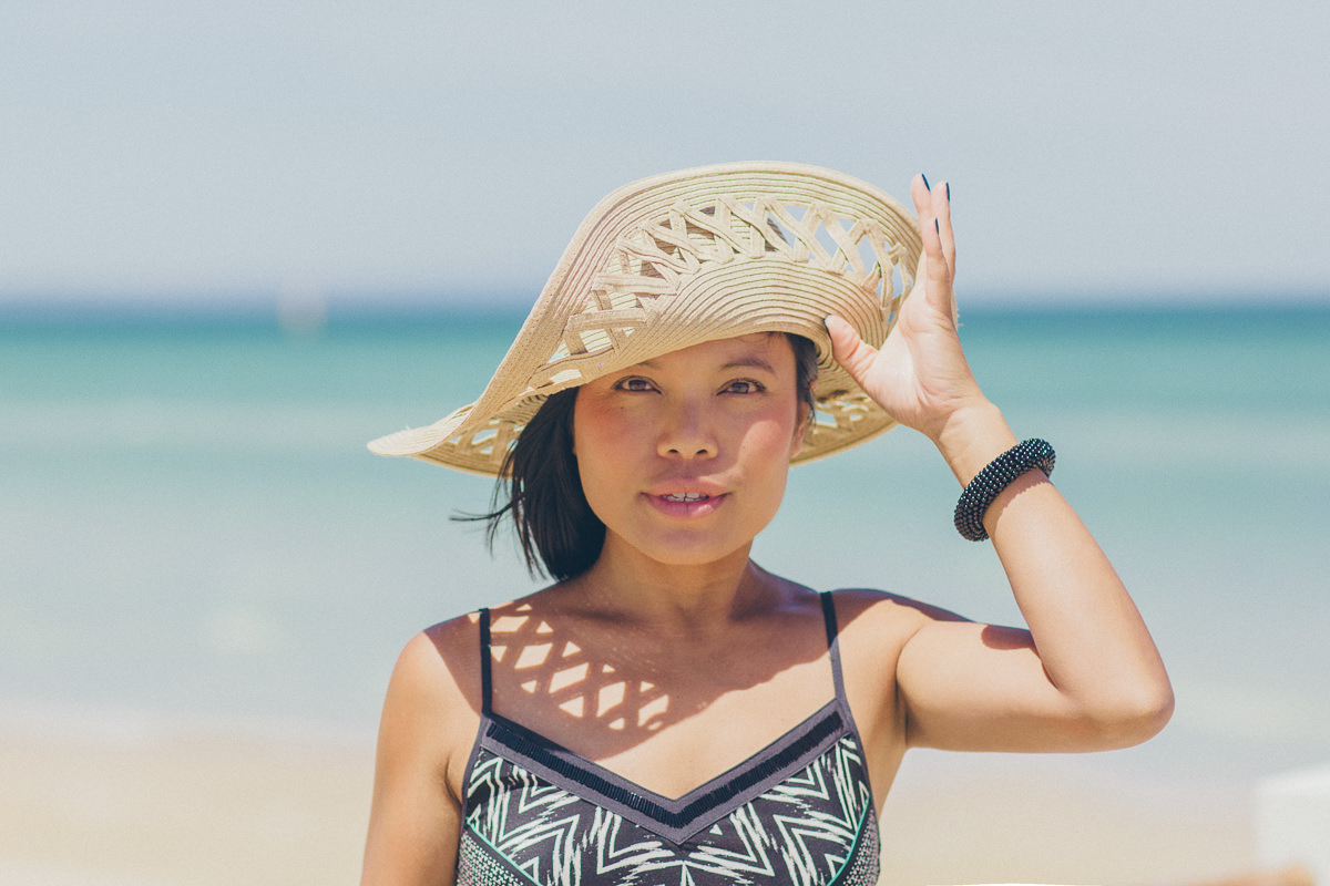 straw hat - asian girl - beach - sun