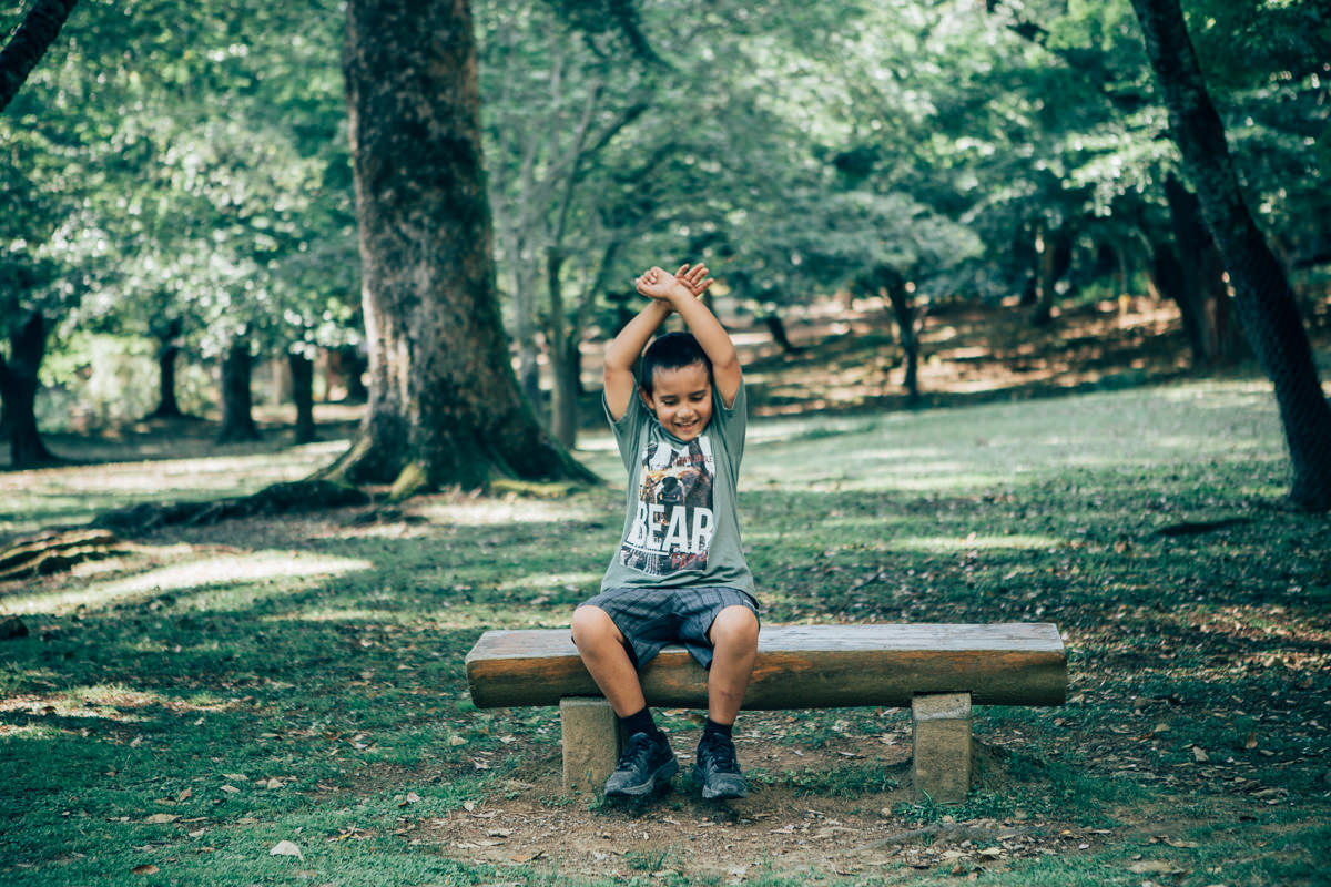 child sitting on bench - children photography