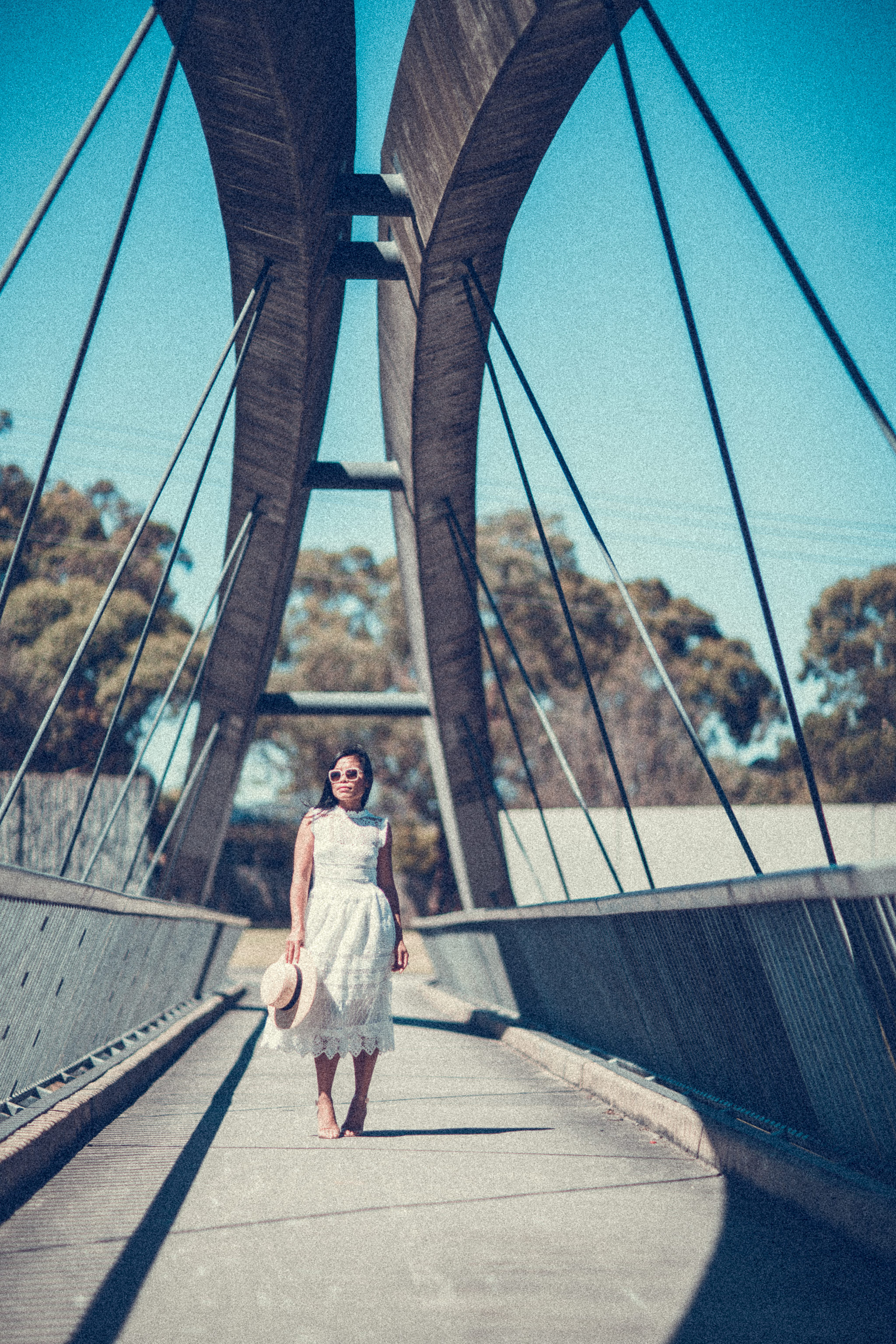 girl on bridge in melbourne - sunny day