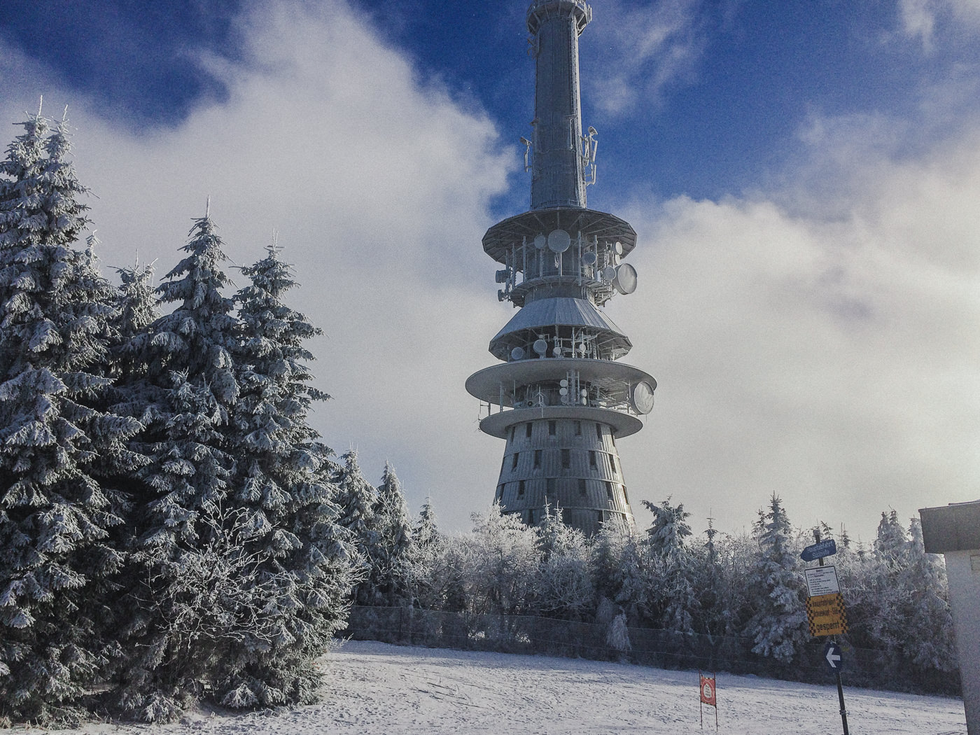 antenna tower on mountain in snow