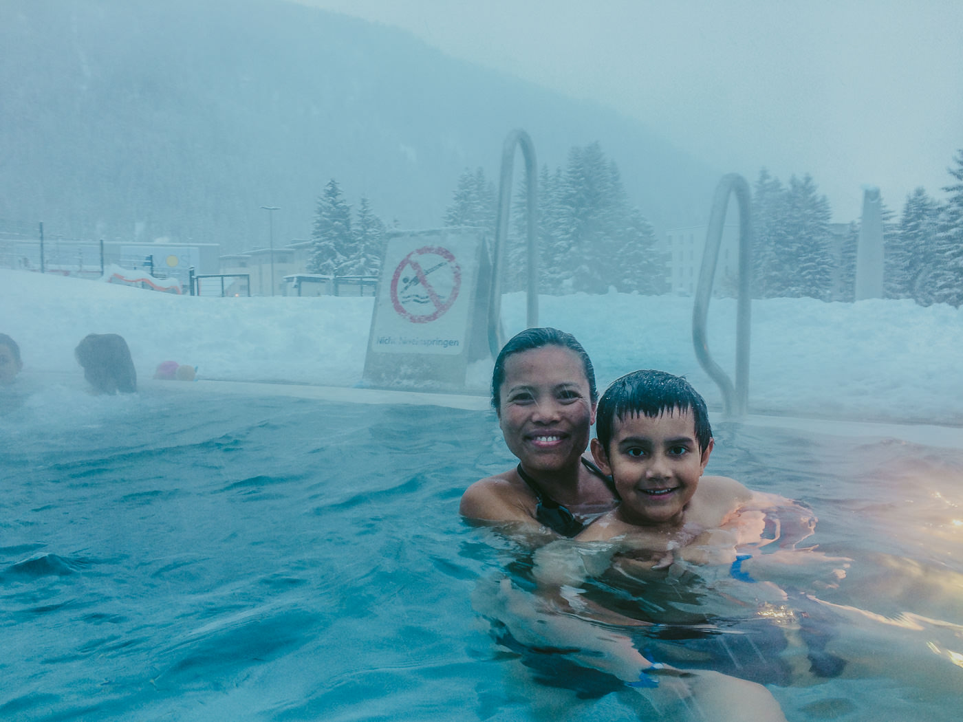 swimming in snow outdoor pool