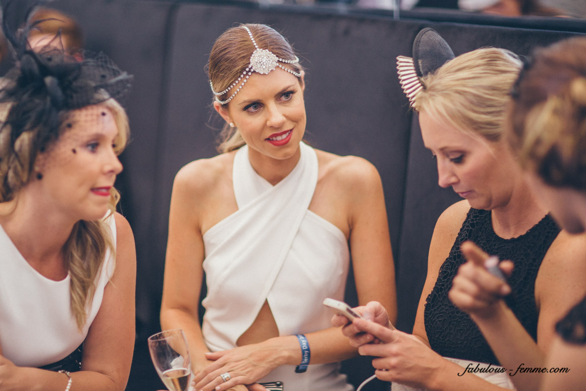 pretty ladies chatting at melbourne cup in tabcorp marquee