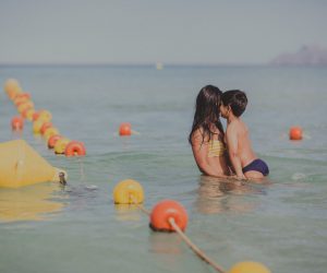mum and son in ocean - greatful love