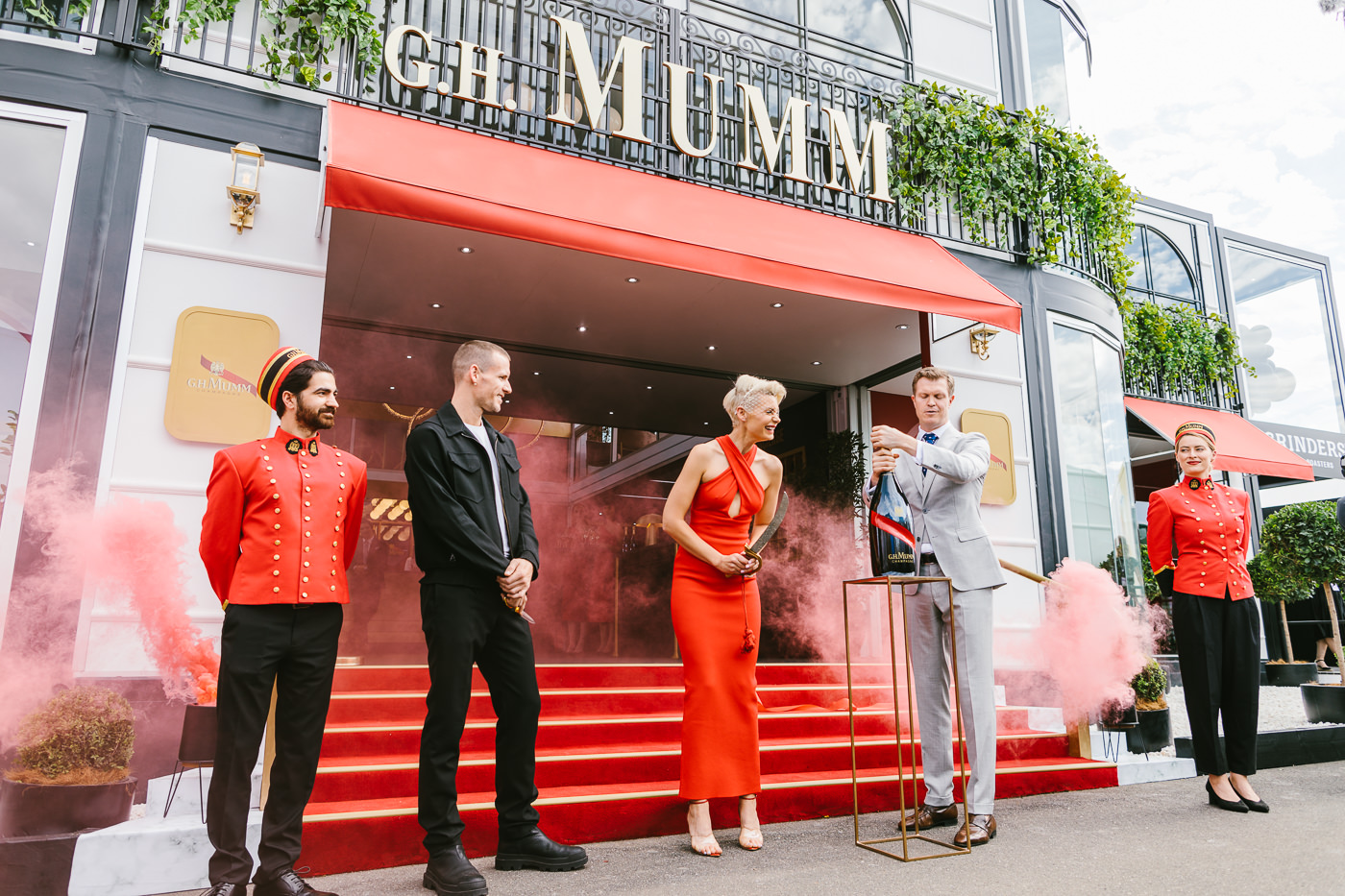 kate peck and dion lee opening the mumm champgane marquee at the birdcage 2019 - Melbourne Spring Racing Carnival