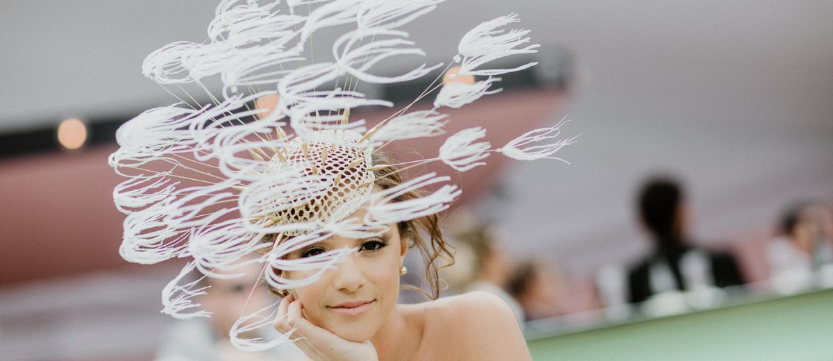 The dandelion headpiece - white feathers moving in wind ! The Pusteblume hat!